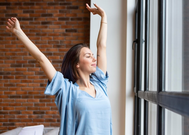 Young woman enjoying some free time at home