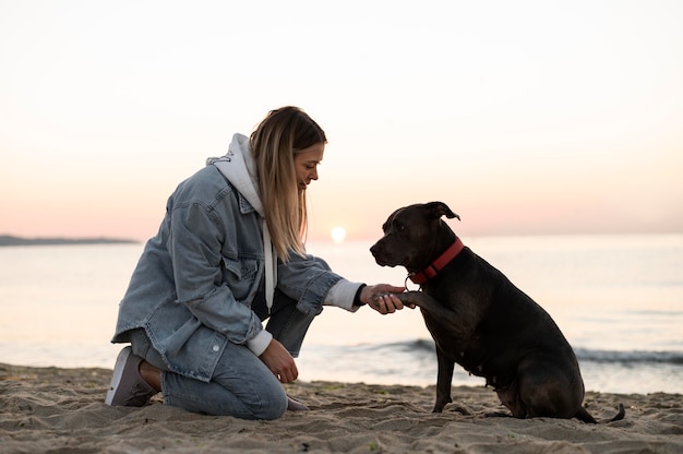 Young woman enjoying some time with her dog