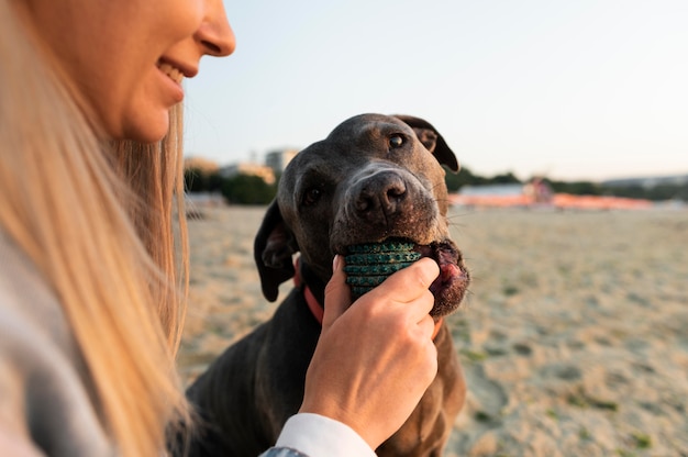 Young woman enjoying some time with her dog