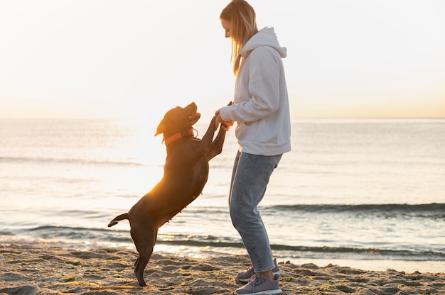 Young woman enjoying some time with her dog