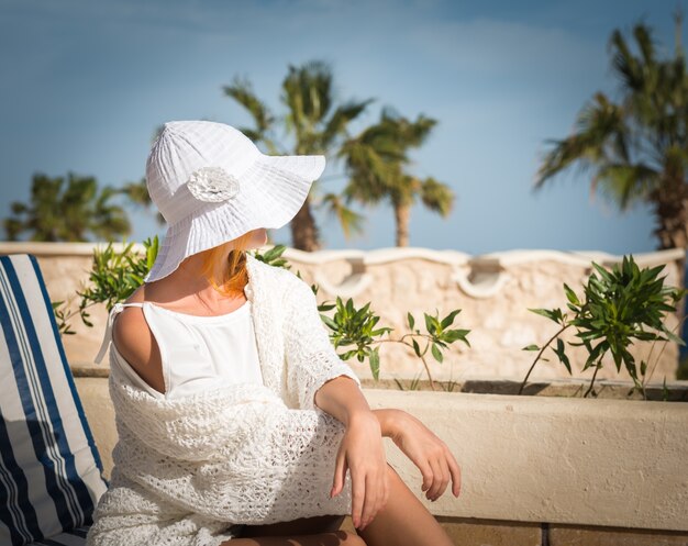 Young woman enjoying sun