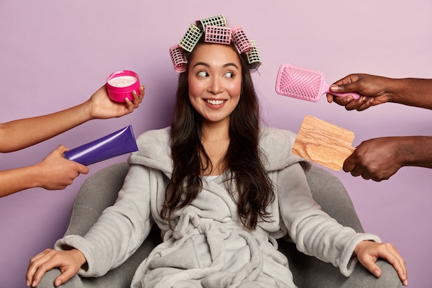 Free Photo young woman enjoys beauty spa at home siting in bathrobe