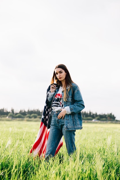 Free photo young woman on grass