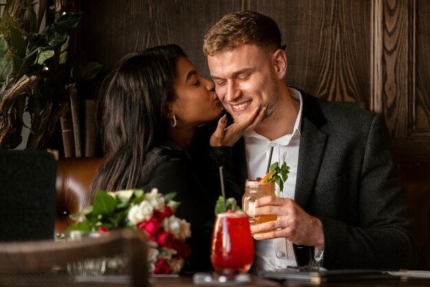 Free Photo young woman having a bouquet of roses from her boyfriend