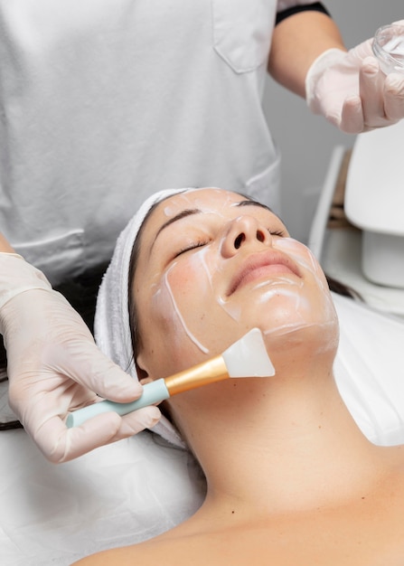 Young woman having a facial skincare treatment