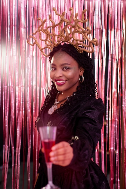 Young woman having fun at costumes party