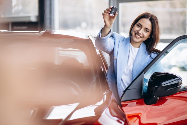 Young woman holding car keys