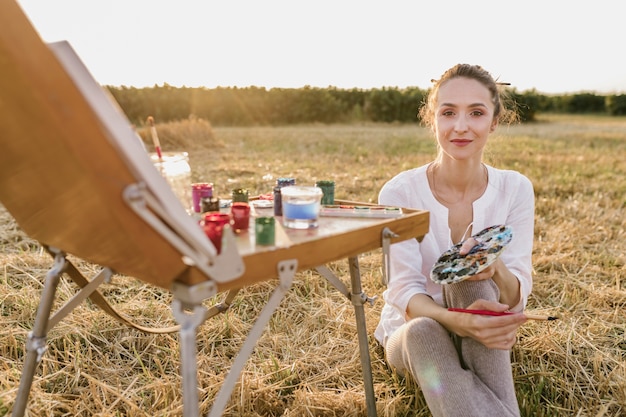 Young woman looking for inspiration in the nature