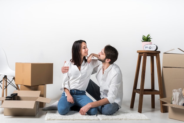 Young woman and man together indoors