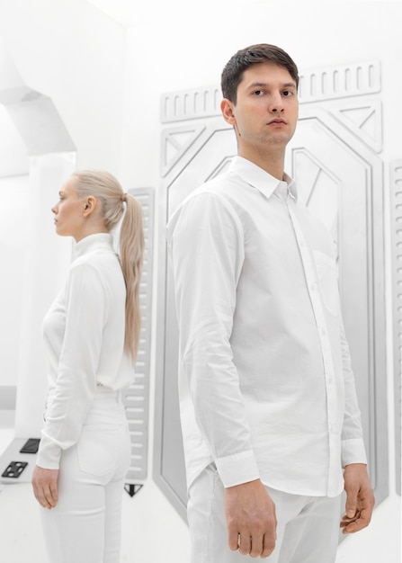 Free photo young woman and man wearing white clothes