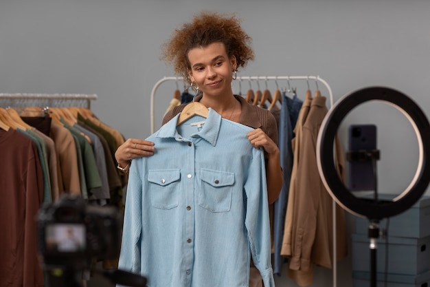 Young woman organizing live shop