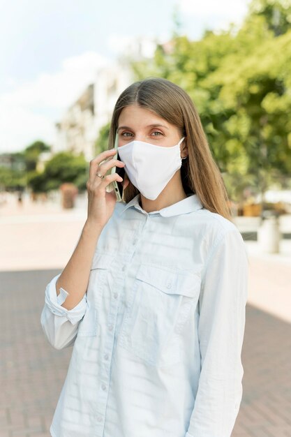 Young woman outdoor wearing mask