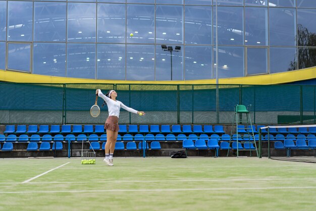 young woman playing tennis