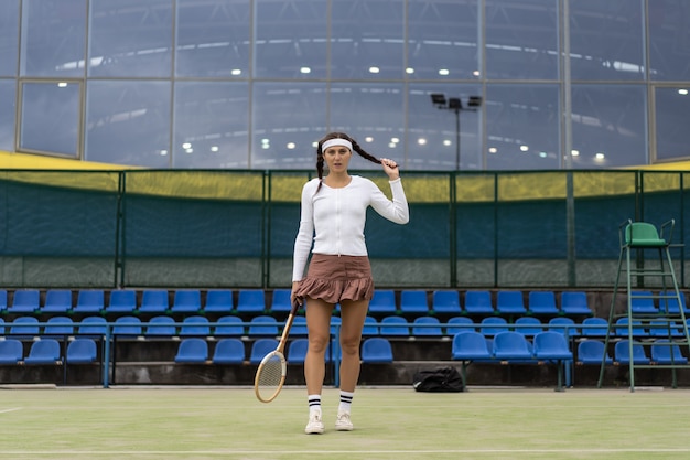 young woman playing tennis