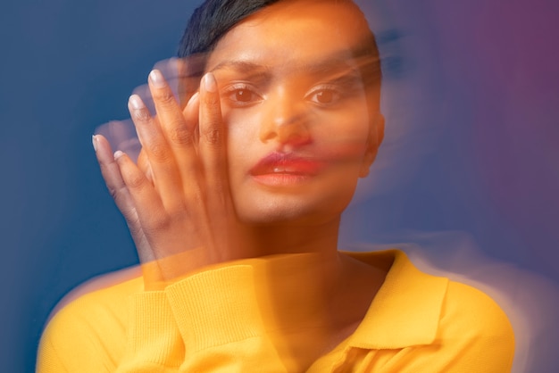 Young woman portrait with overexposed moving style