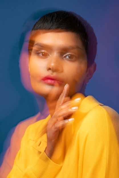 Young woman portrait with overexposed moving style