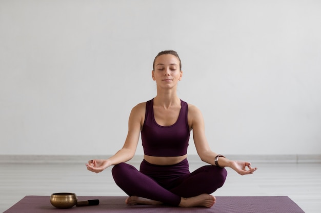 Free photo young woman practicing meditation