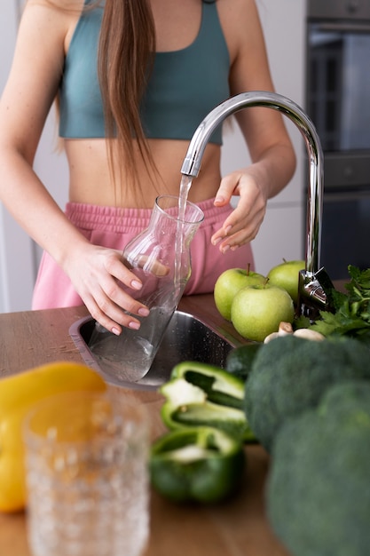 Young woman preparing her nutrition diet