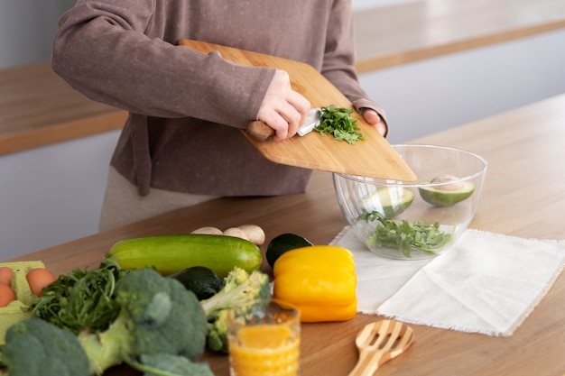 Free Photo young woman preparing her nutrition diet