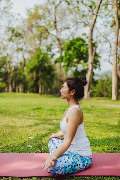 Young woman relaxing with yoga