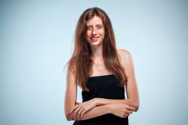 The young woman's portrait with happy emotions