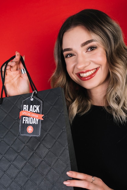 Young woman shopping on black friday