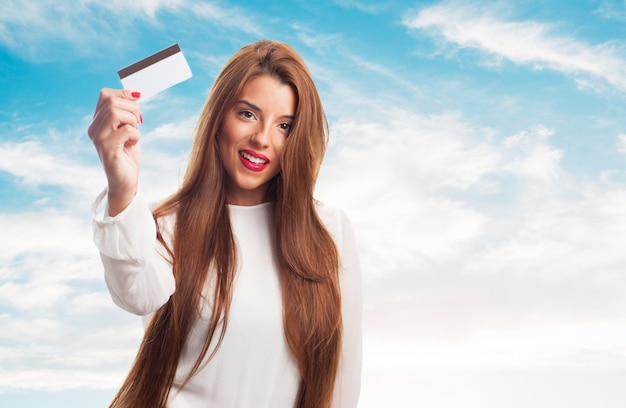 a young woman shopping with her credit card