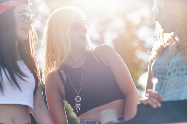 Young woman spending time together in skatepark