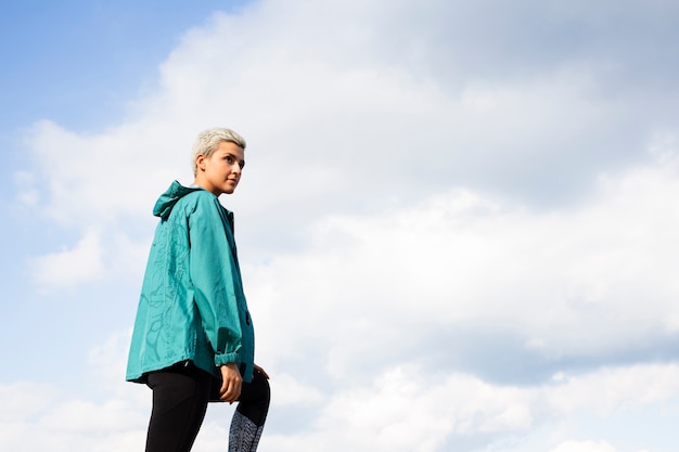 Young woman in sportswear in nature