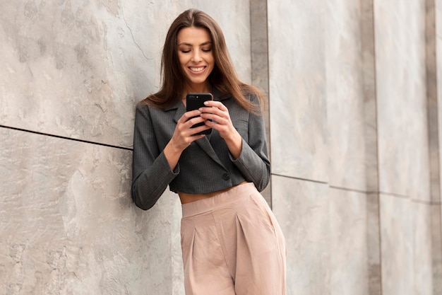 Young woman standing in a clean urban space