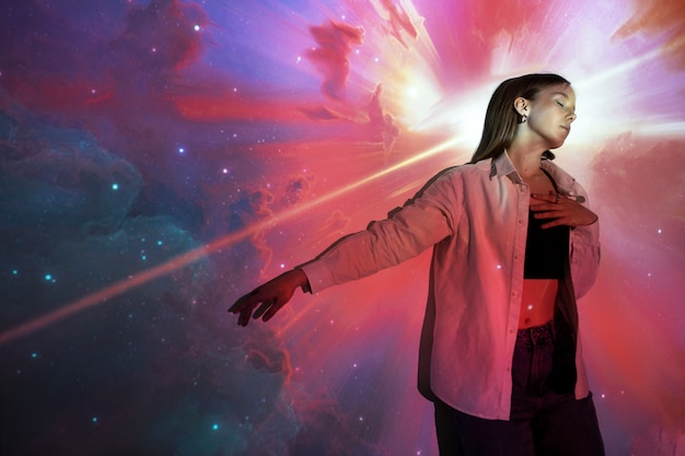 Free Photo young woman standing in universe texture projection