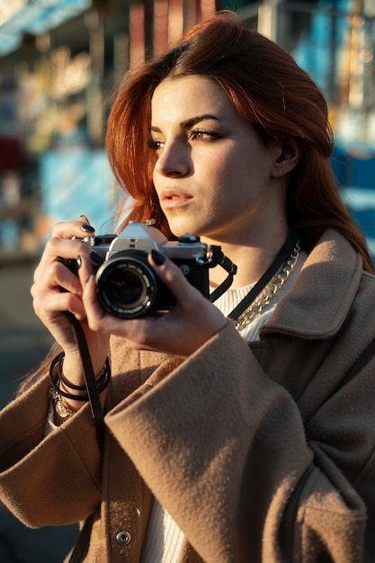 Young woman taking photos