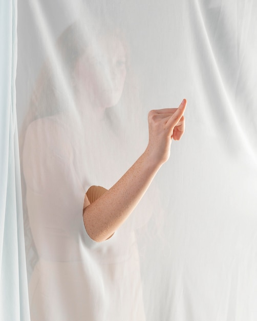 Young woman teaching sign language