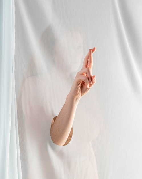 Young woman teaching sign language