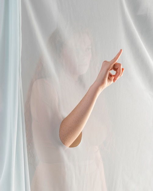 Free Photo young woman teaching sign language