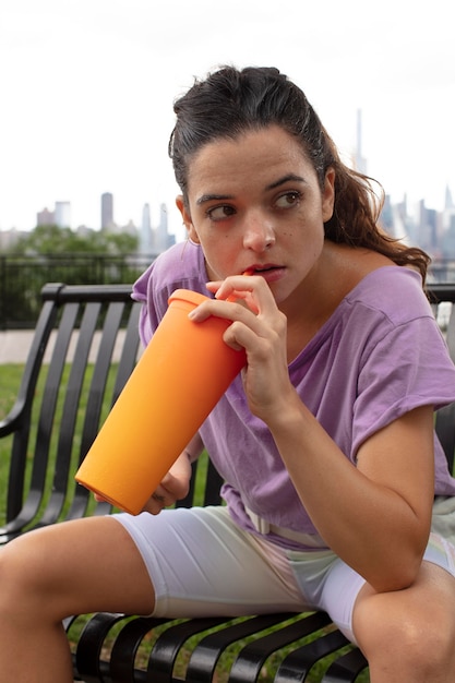 Young woman tolerating the heat wave