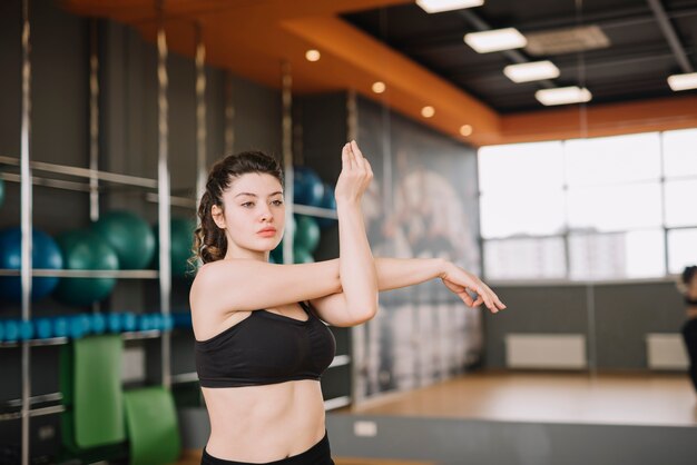 Young woman training at the gym