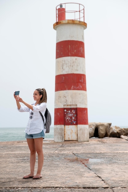 Free photo young woman traveling without covid