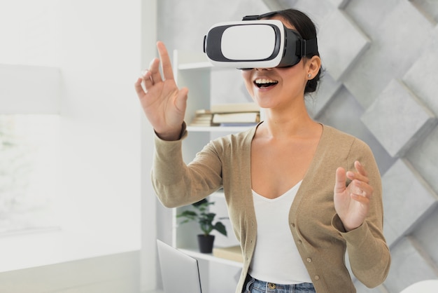 Young woman trying virtul headset