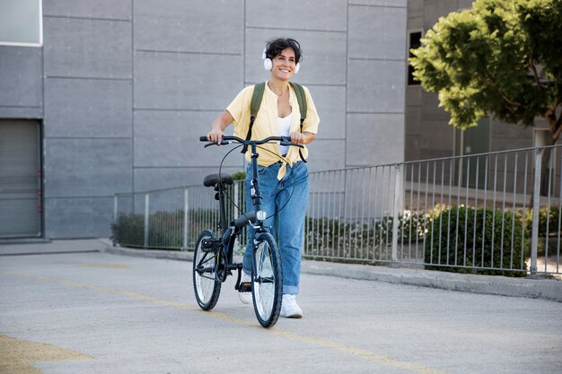 Young woman using her folding bike