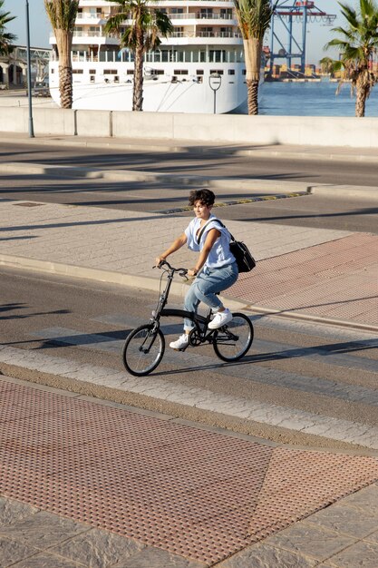 Young woman using her folding bike