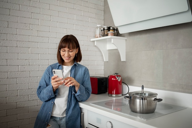 Young woman using home technology