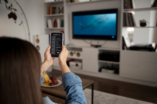 Free Photo young woman using home technology