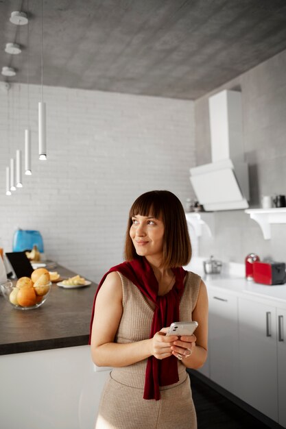 Young woman using home technology