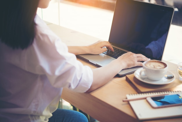 Young woman using laptop computer