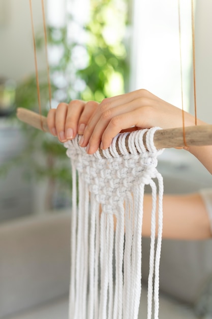 Free Photo young woman using the macrame technique