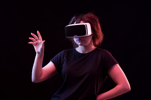 Young woman using VR glasses