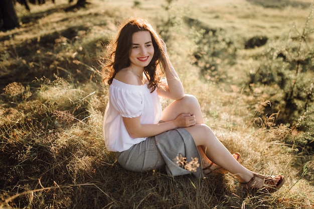 Free Photo young woman walking in forest