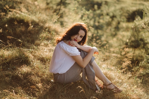 Young woman walking in forest