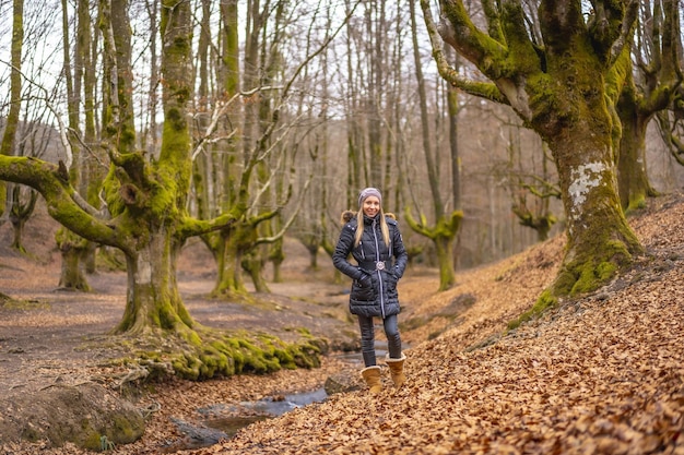 Young woman walking in Otzarreta Forest in the natural park of Gorbea Bizkaia Basque Country